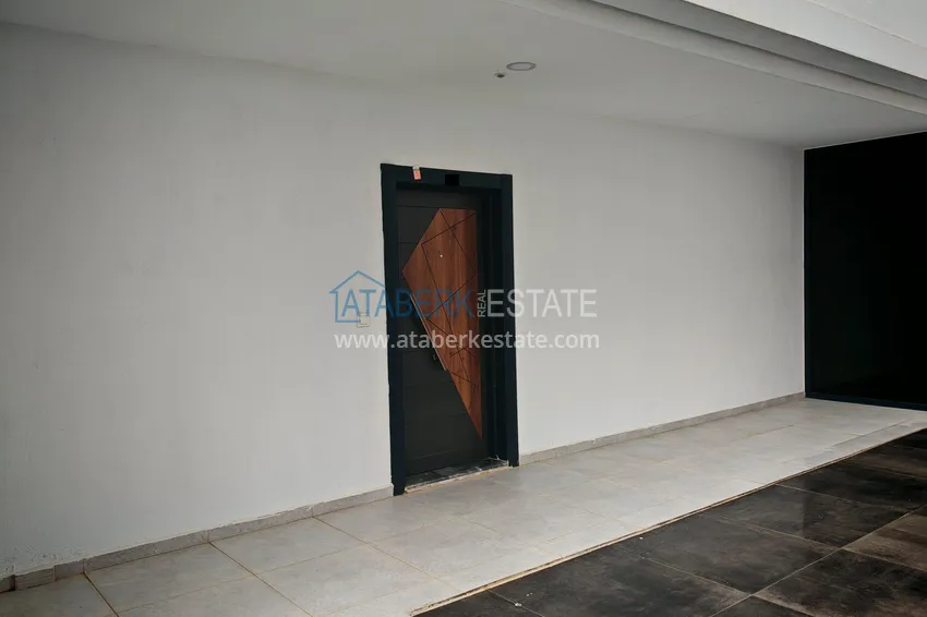 Приобрести Квартира 1+1 с мебелью и участком земли в жилом комплексе - Алания, район Авсаллар 18