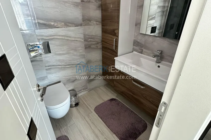 Приобрести Линейная квартира 3+1 с панорамным видом в центре Махмутлара — срочная продажа, без мебели 19 