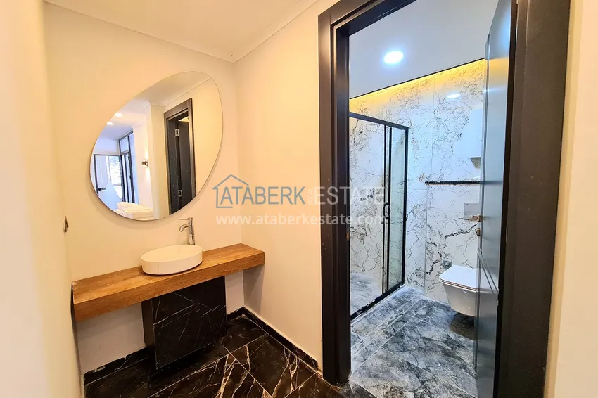 Двухкомнатная квартира с чистовой отделкой под ключ в Алании 29 