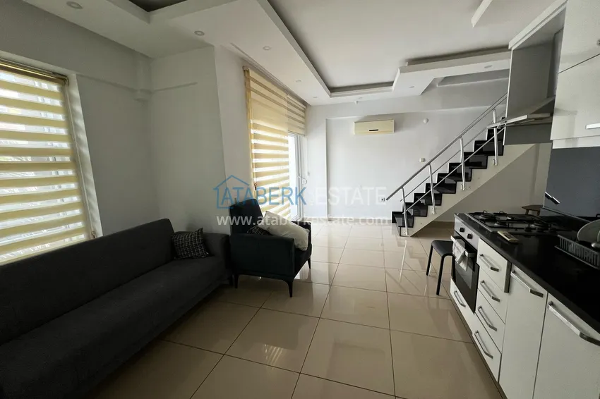 Приобрести Двухуровневый пентхаус с мебелью в центре Алании – район пляжа Клеопатра  3 