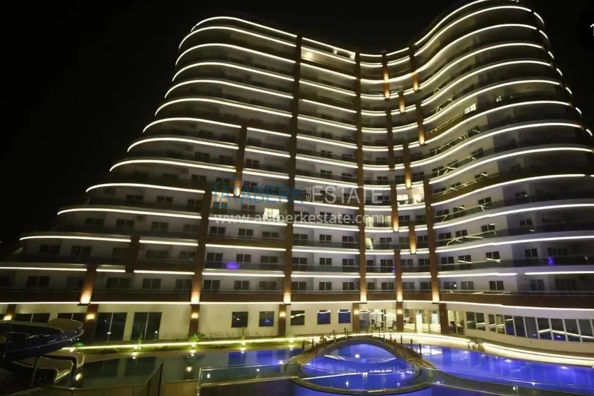 Линейная квартира 3+1 с панорамным видом в центре Махмутлара — срочная продажа, без мебели 1 