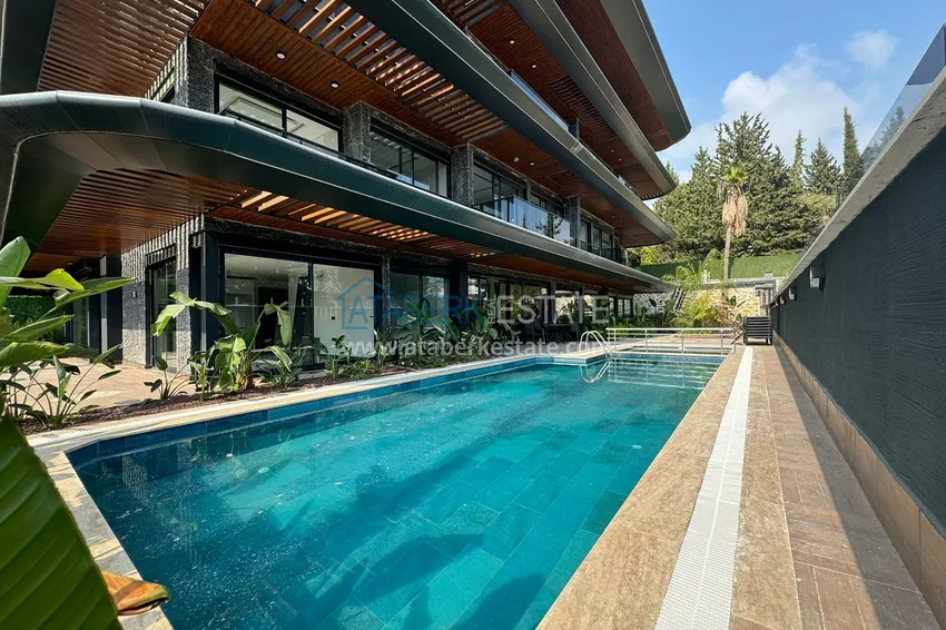 Двухкомнатная квартира с чистовой отделкой под ключ в Алании 4 