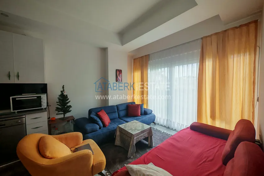 Приобрести Квартира 1+1 с мебелью и участком земли в жилом комплексе - Алания, район Авсаллар 4