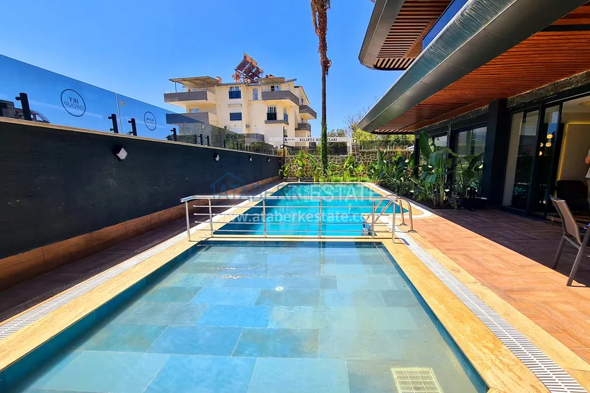 Двухкомнатная квартира с чистовой отделкой под ключ в Алании 5 