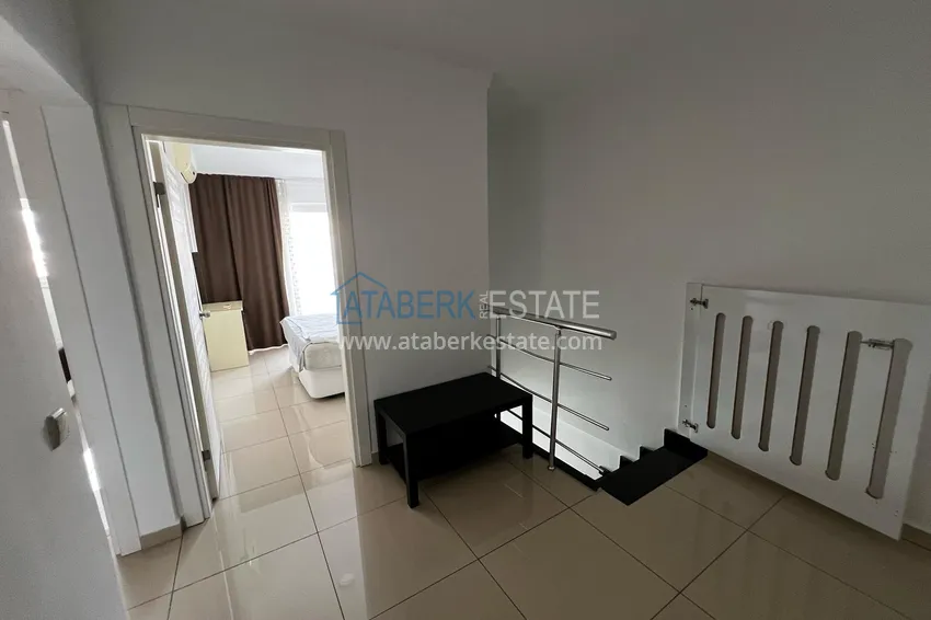 Приобрести Двухуровневый пентхаус с мебелью в центре Алании – район пляжа Клеопатра  8 