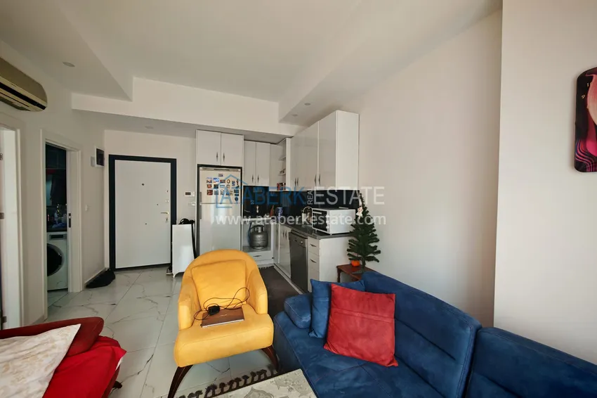 Приобрести Квартира 1+1 с мебелью и участком земли в жилом комплексе - Алания, район Авсаллар 6