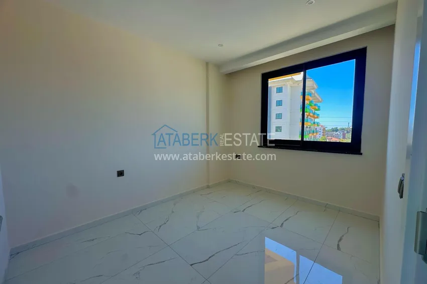 Приобрести Горящее предложение, недвижимость с видом на море – двухкомнатная квартира в Авсалларе! 6