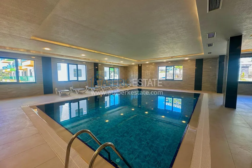 Горящее предложение, недвижимость с видом на море – двухкомнатная квартира в Авсалларе! 7