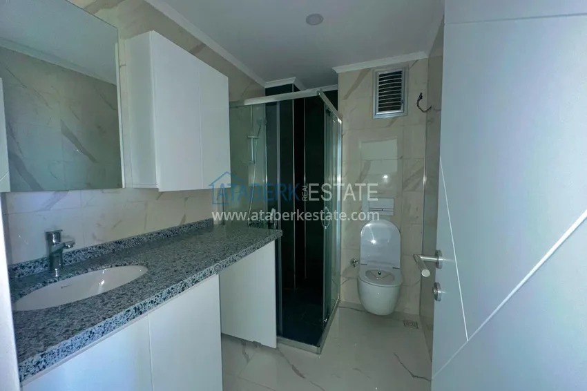 Приобрести Горящее предложение, недвижимость с видом на море – двухкомнатная квартира в Авсалларе! 8