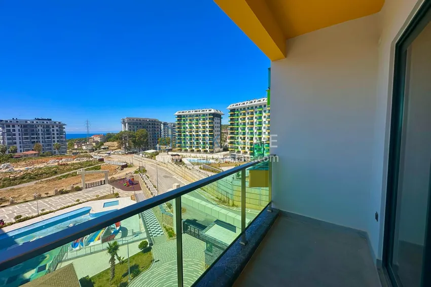 Приобрести Горящее предложение, недвижимость с видом на море – двухкомнатная квартира в Авсалларе! 9