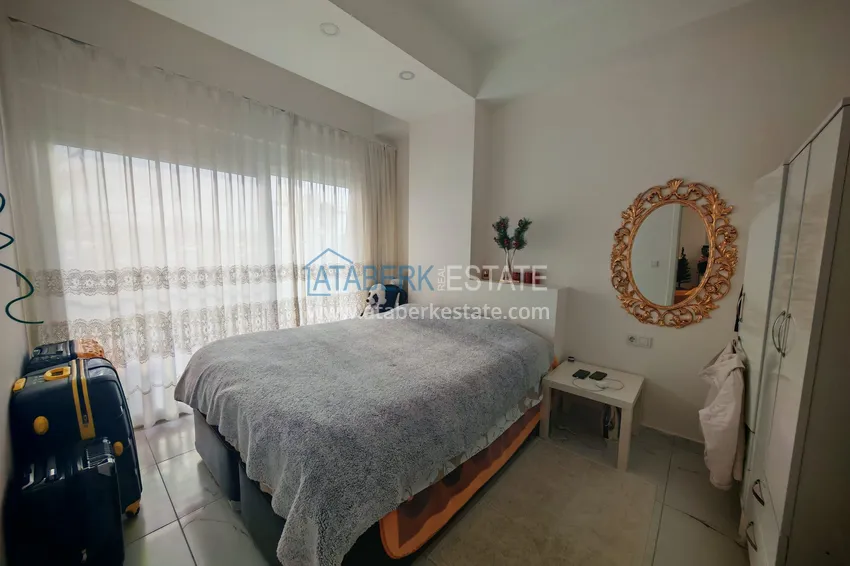 Приобрести Квартира 1+1 с мебелью и участком земли в жилом комплексе - Алания, район Авсаллар 9