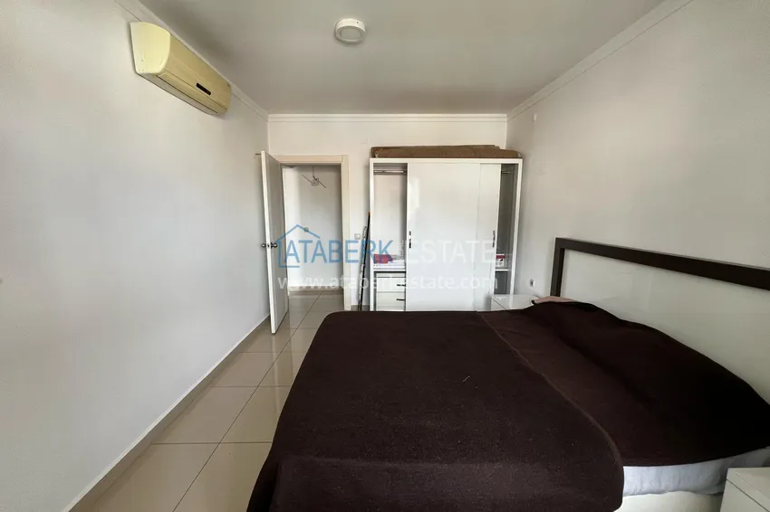 Приобрести Двухуровневый пентхаус с мебелью в центре Алании – район пляжа Клеопатра  11 