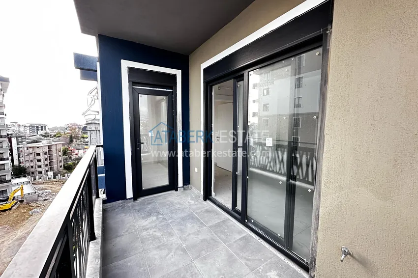 Приобрести Двухкомнатная квартира с частичным видом на море – Авсаллар, Алания 13 