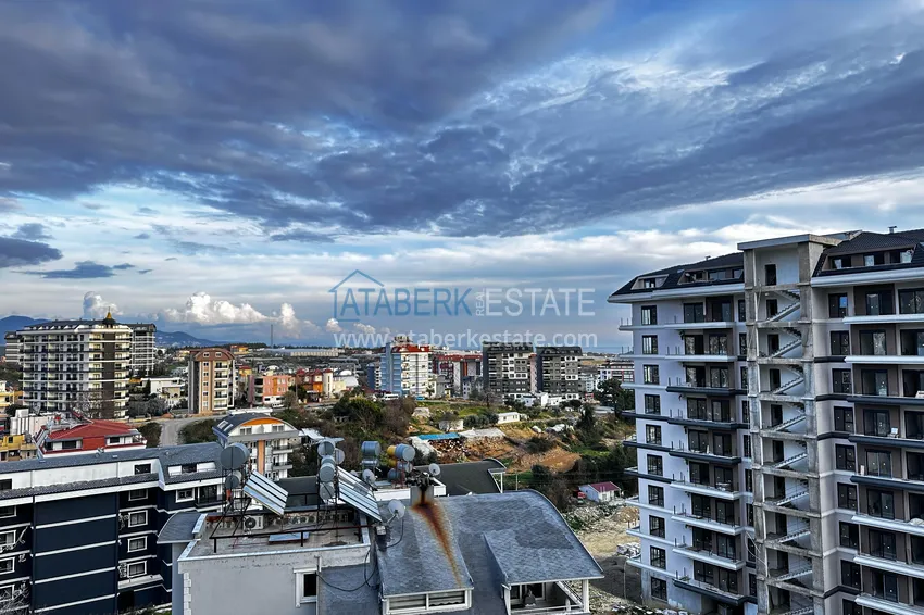 Приобрести Двухкомнатная квартира с частичным видом на море – Авсаллар, Алания 14 