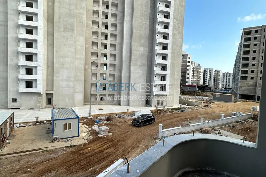 Приобрести Квартиры в Мерсине, район Томюк - от инвестора на этапе строительства. Подходит для краткосрочной аренды 14 