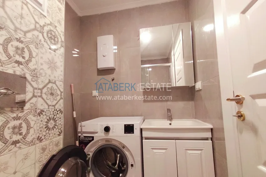 Приобрести Двухкомнатная квартира с мебелью в современном комплексе – Алания, район Махмутлар 15 