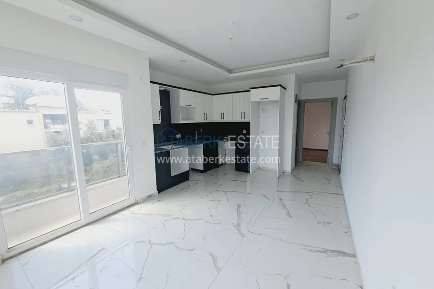 Приобрести Угловая квартира 1+1 с чистовой отделкой в современном комплексе - район Авсаллар, Алания 1 