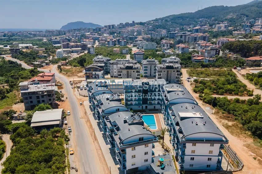 Дуплекс 2+1 с мебелью и видом на горы в молодом современном комплексе, район Оба – Алания 2 