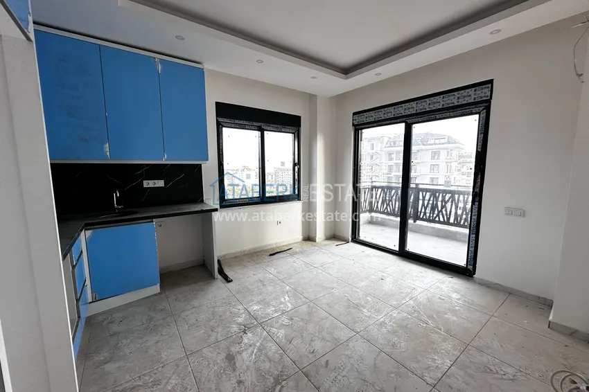 Приобрести Двухкомнатная квартира с частичным видом на море – Авсаллар, Алания 3 