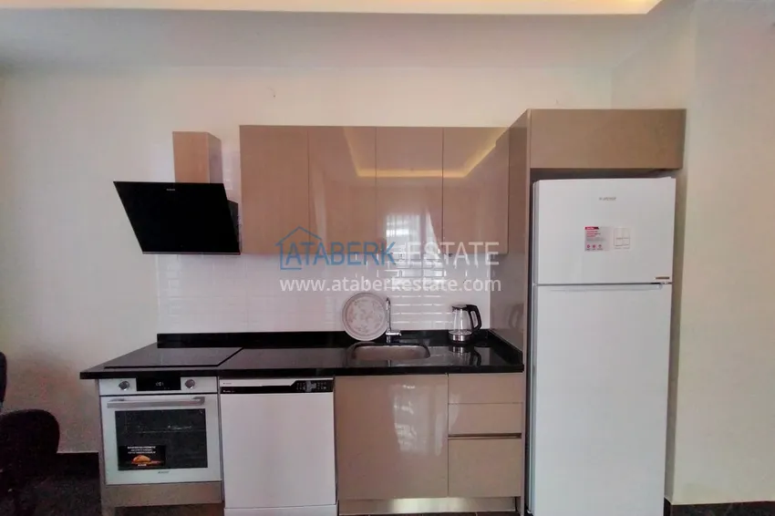 Приобрести Двухкомнатная квартира с мебелью в современном комплексе – Алания, район Махмутлар 8 