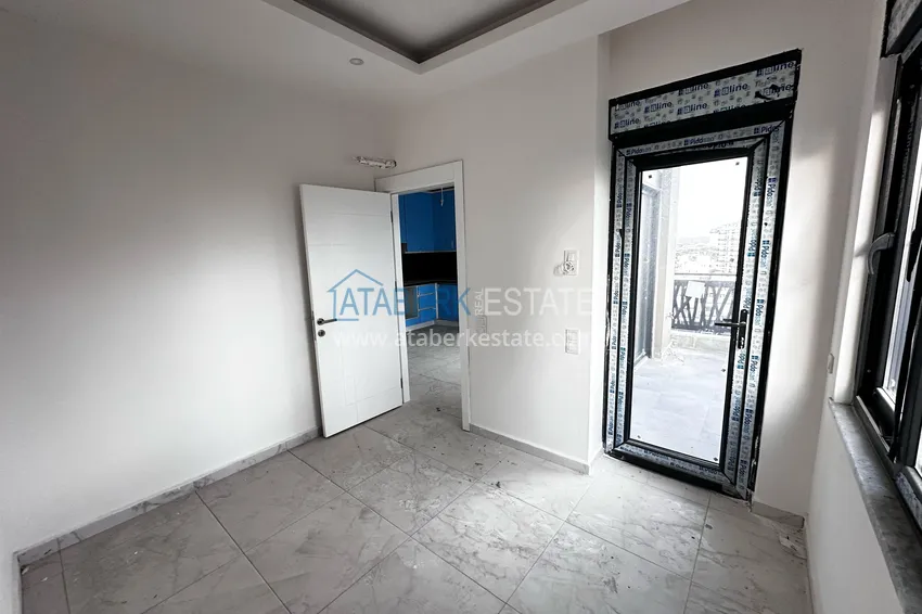 Приобрести Двухкомнатная квартира с частичным видом на море – Авсаллар, Алания 10 