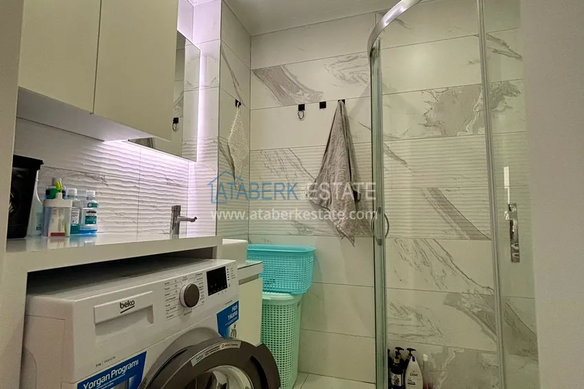 Приобрести Двухкомнатная квартира под ключ в районе Махмутлар, Алания 9 