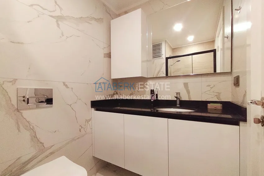 Приобрести Аренда квартиры 1+1 в Алании, Авсаллар - комфорт, вдохновлённый атмосферой курорта A32 10 