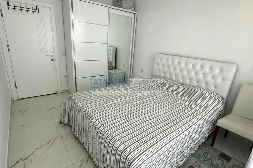 Приобрести Двухкомнатная квартира в центре Алании с мебелью — подходит для ВНЖ и отдыха у моря 4 