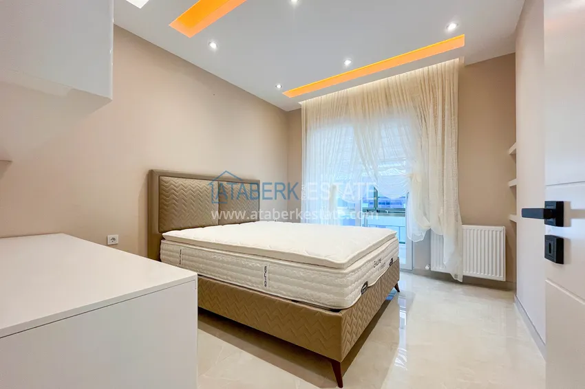 Приобрести Стильная квартира 2+1 с мебелью в Махмутларе - престижный комплекс с инфраструктурой 12 