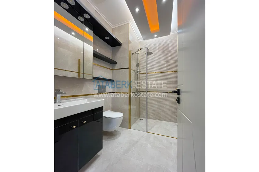 Приобрести Стильная квартира 2+1 с мебелью в Махмутларе - престижный комплекс с инфраструктурой 15 