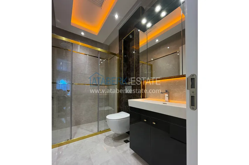 Приобрести Стильная квартира 2+1 с мебелью в Махмутларе - престижный комплекс с инфраструктурой 18 