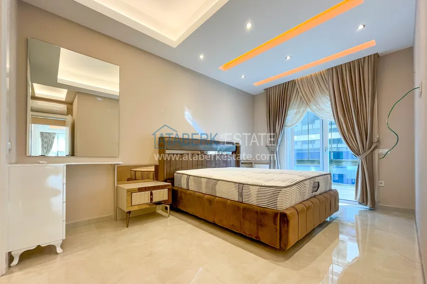 Приобрести Стильная квартира 2+1 с мебелью в Махмутларе - престижный комплекс с инфраструктурой 10 