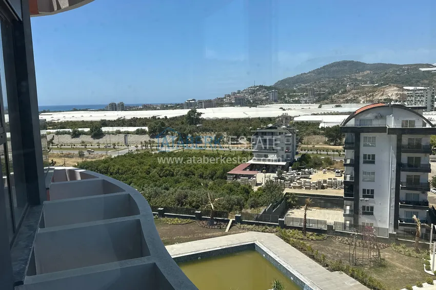 Приобрести Квартира 1+1 с видом на море и чистовой отделкой в новом комплексе - Алания, район Демирташ 12 