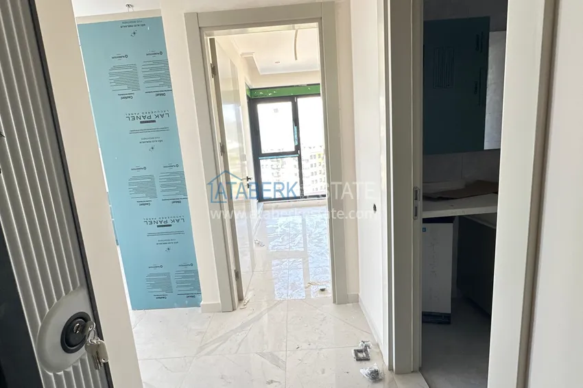 Приобрести Квартира 1+1 с видом на море и чистовой отделкой в новом комплексе - Алания, район Демирташ 3 