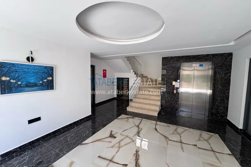 Квартира 1+1 с дизайнерским интерьером – Алания, Махмутлар 14