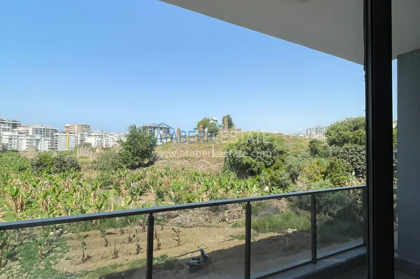 Приобрести Частично меблированная двухкомнатная квартира в районе Махмутлар, Алания 4