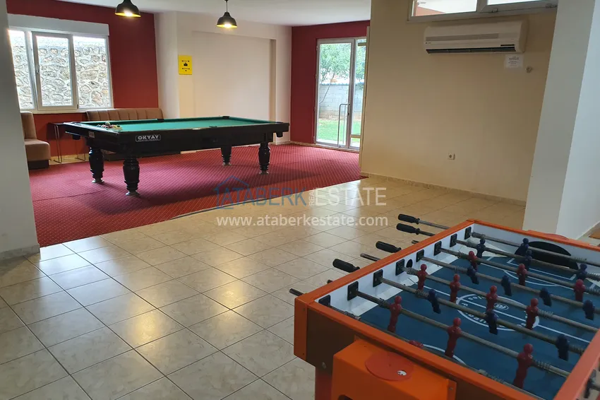 Квартира 3+1 с мебелью в благоустроенном комплексе — Тосмур, Алания. Подходит для получения ВНЖ 23 