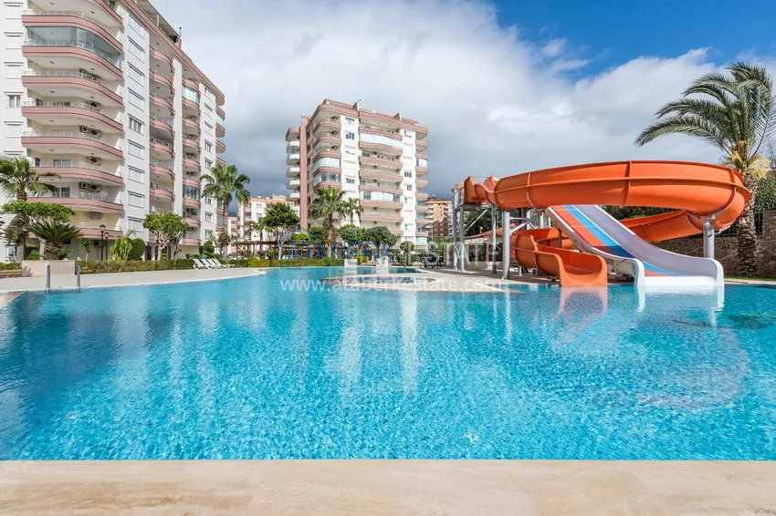 Квартира 3+1 с мебелью в благоустроенном комплексе — Тосмур, Алания. Подходит для получения ВНЖ 5 