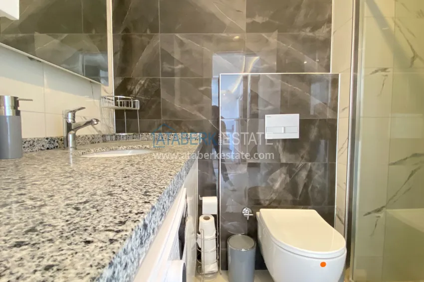 Приобрести Квартира 2+1 под ключ с видом на море в районе Махмутлар, Алания 22 