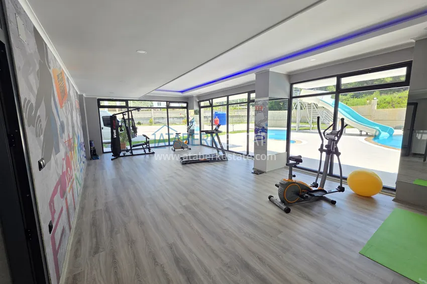 Двухкомнатная квартира с видом на лес по привлекательной цене — Авсаллар, Алания 10 