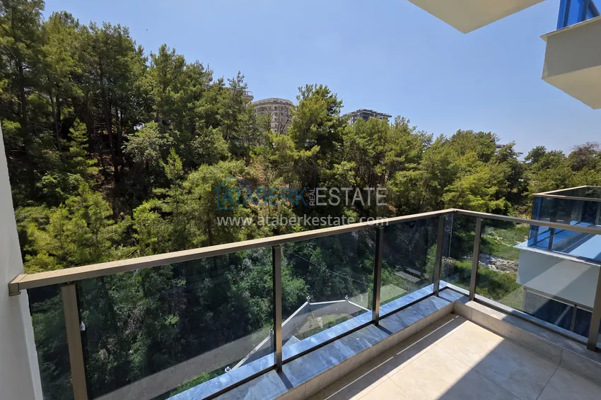 Приобрести Двухкомнатная квартира с видом на лес по привлекательной цене — Авсаллар, Алания 8 