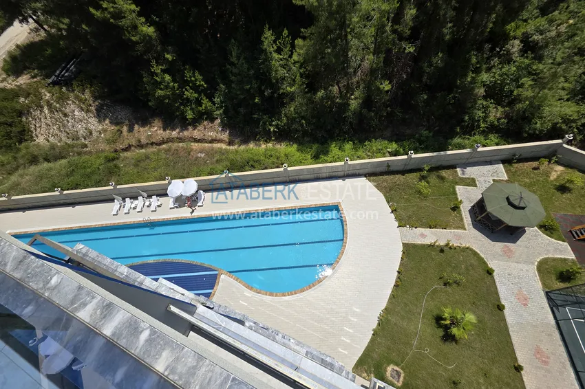 Приобрести Двухкомнатная квартира с видом на лес по привлекательной цене — Авсаллар, Алания 9 