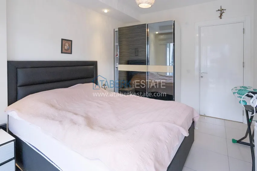 Приобрести Трехкомнатная квартира с мебелью в благоустроенном комплексе – район Оба, Алания 9 