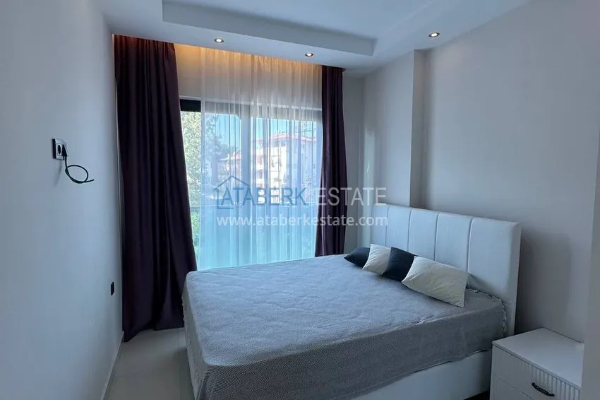 Приобрести Двухкомнатная квартира с мебелью в комфортабельном комплексе — район Авсаллар, Алания 6 