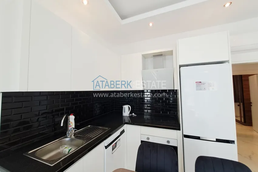 Приобрести Квартира 1+1 с двумя балконами под ключ в Махмутларе - всего в 500 м от моря 7