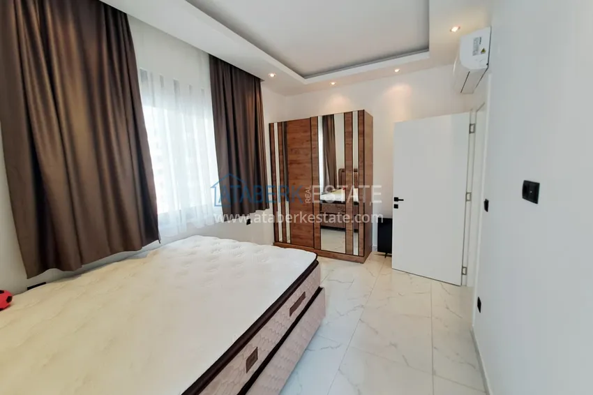 Приобрести Квартира 1+1 с двумя балконами под ключ в Махмутларе - всего в 500 м от моря 13