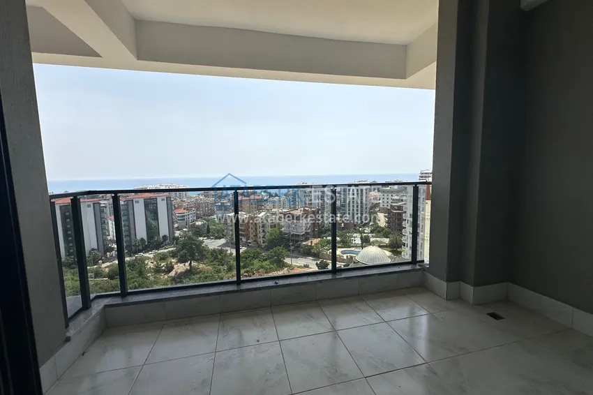 Приобрести Дуплекс-пентхаус 2+1 с видом на море и крепость - Тосмур, Алания. Подходит для ВНЖ 17 