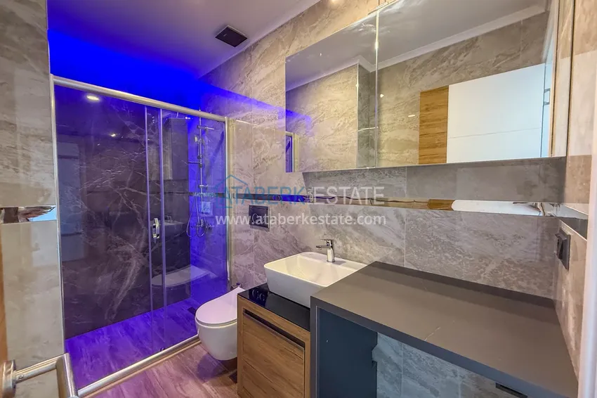 Приобрести Современные квартиры и пентхаусы с видом на море в районе Авсаллар, Алания - рассрочка на 2 года 14