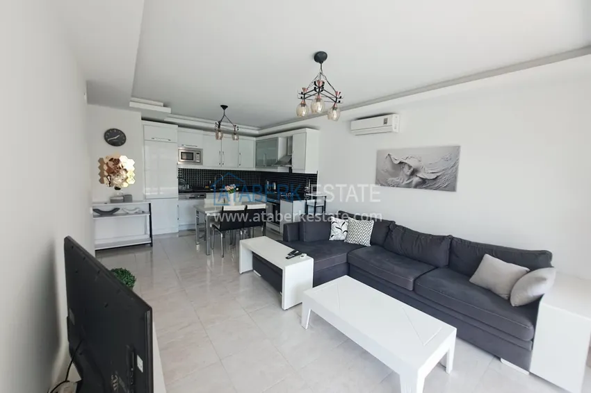 Приобрести Квартира 1+1 с мебелью в районе Оба, Алания - застекленный балкон, 1 этаж 2 