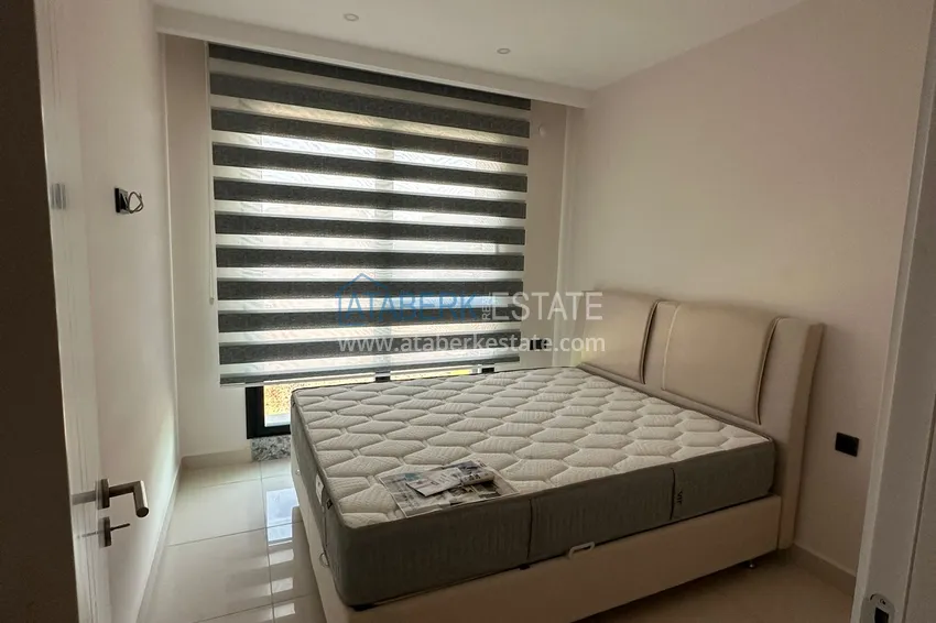 Приобрести Новая меблированная квартира 1+1 с видом на море — Каргыджак, Алания, от собственника 7 